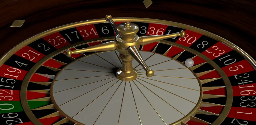 Roulette wheel with the ivory ball in pocket 23